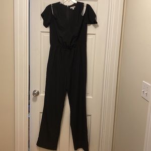 Halston, size 8, off the shoulder, black jumpsuit with back zip.